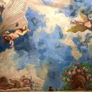 A ceiling mural depicting angels, showcasing intricate artistry by mural artists in London.