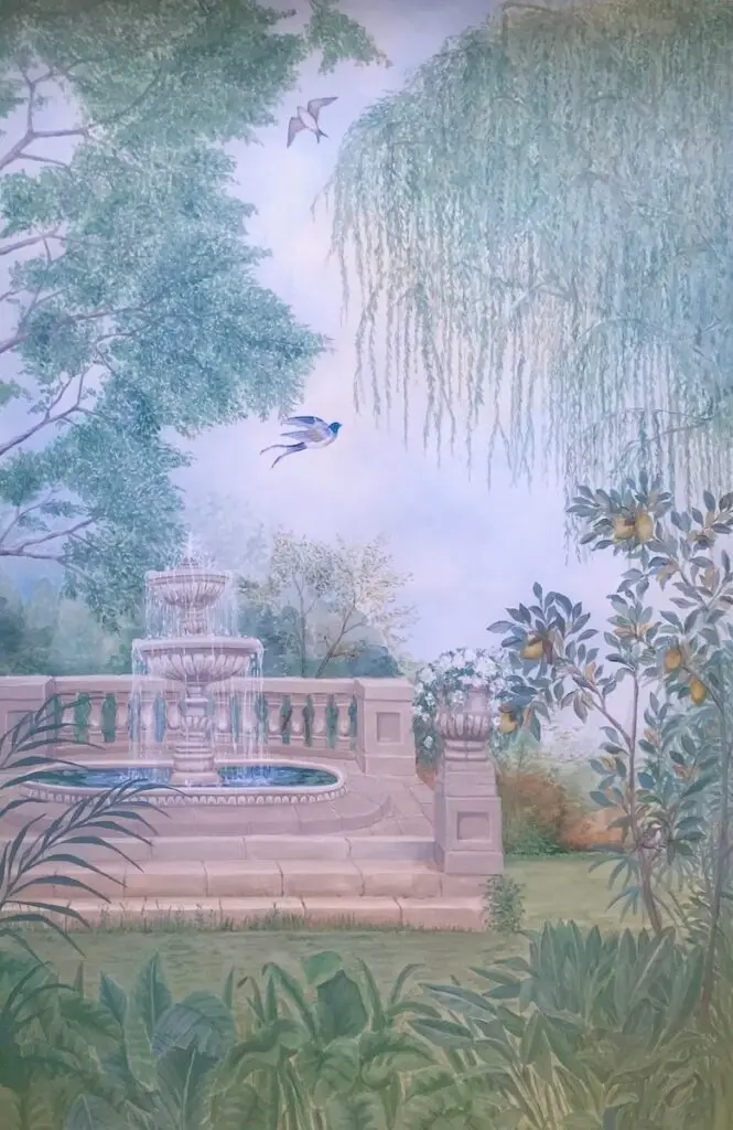 A vibrant painting of a garden featuring a fountain and birds, showcasing the beauty of nature in London murals.