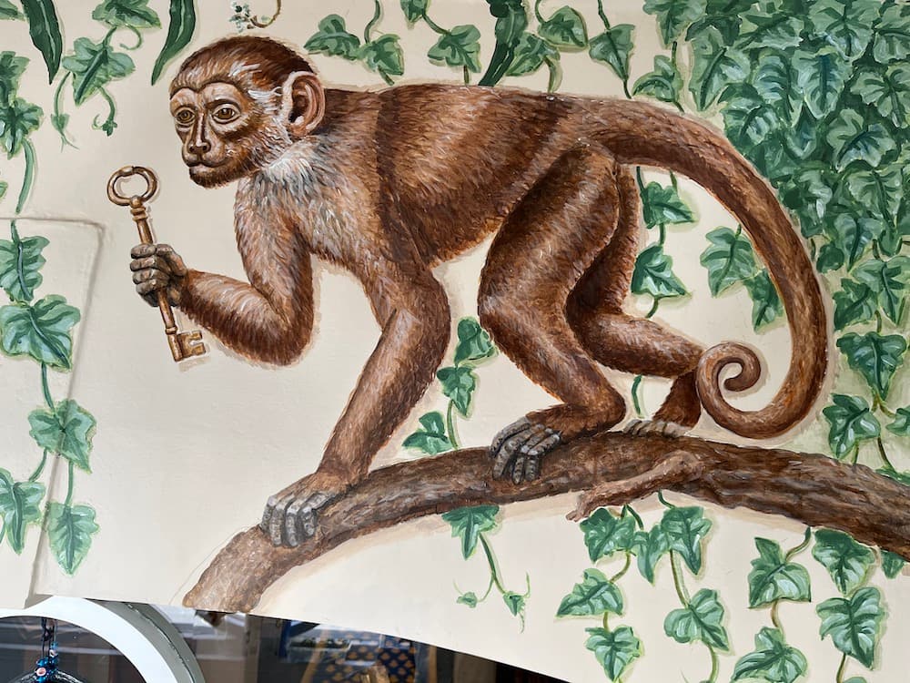Mural with monkey holding a key